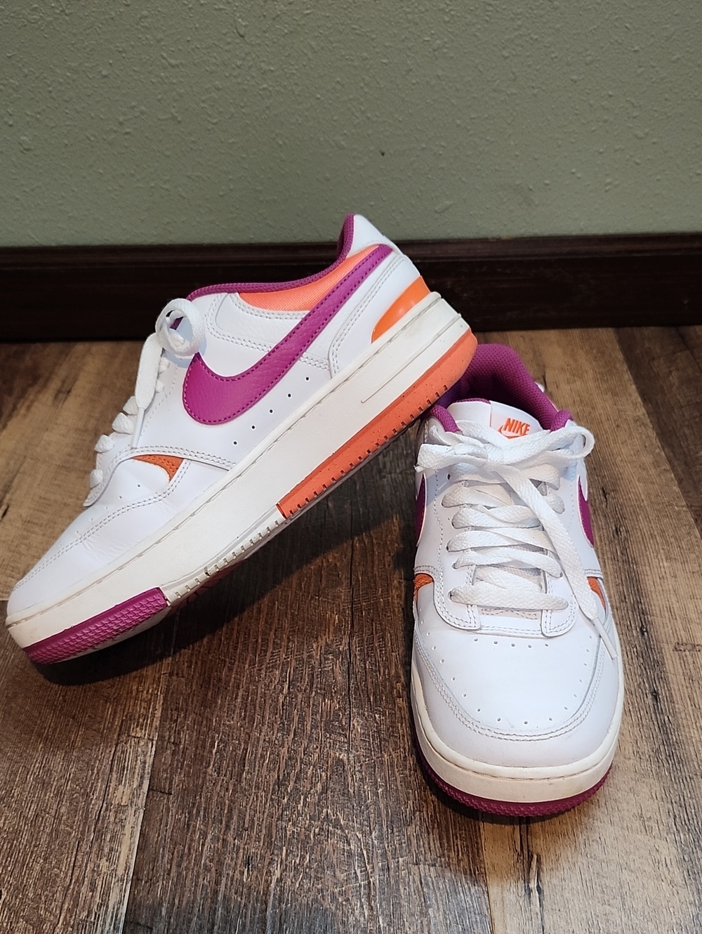 Nike Women's White Sneakers with Pink and Orange Accents